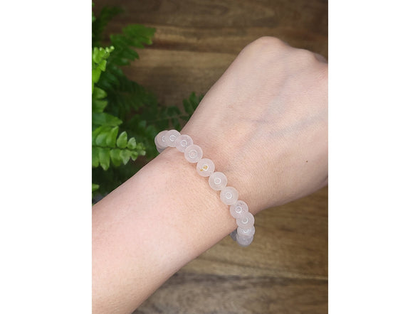 The Laughing Buddhaa Rose Quartz Bracelet for Love and Compassion